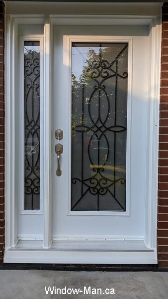 Front door. with sidelight. Blackburn Wrought iron glass insert